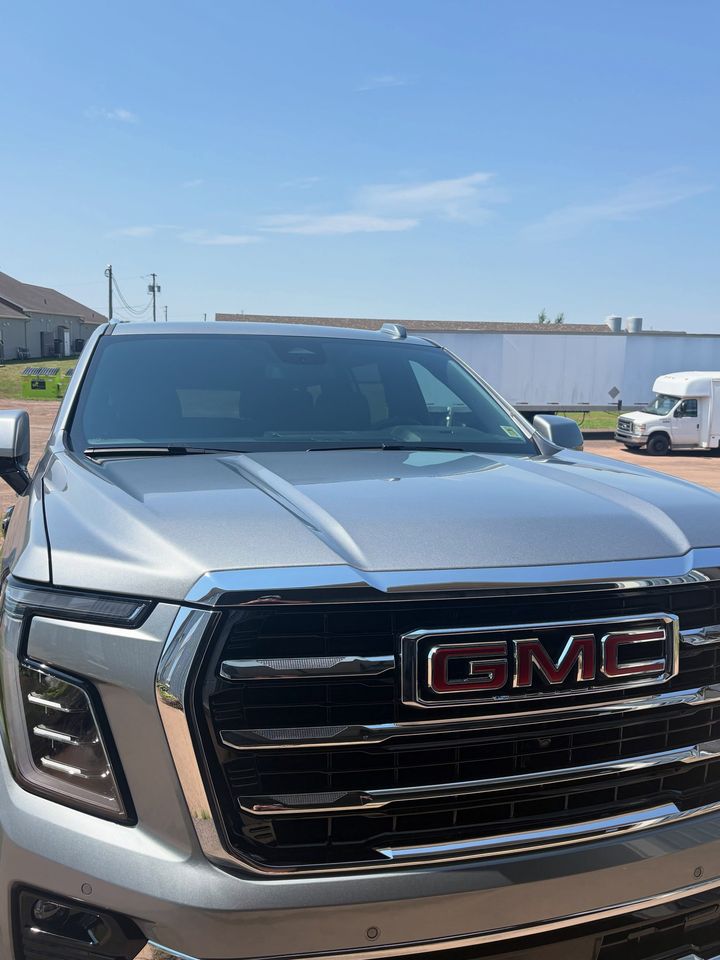 Front grille of the grey 2026 GMC Yukon, detailed by MG Detailing