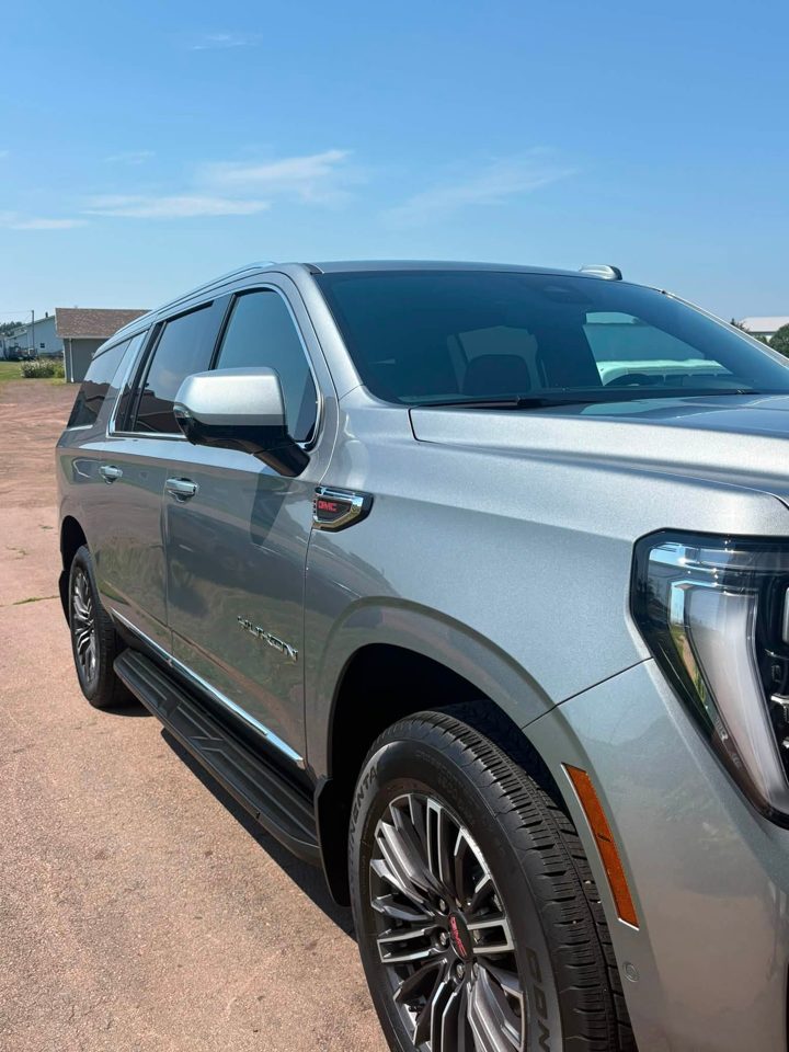 grey gmc yukon front quarter, detailed by MG Detailing