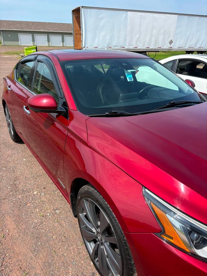 red nissan altima front quarter, detailed by MG Detailing
