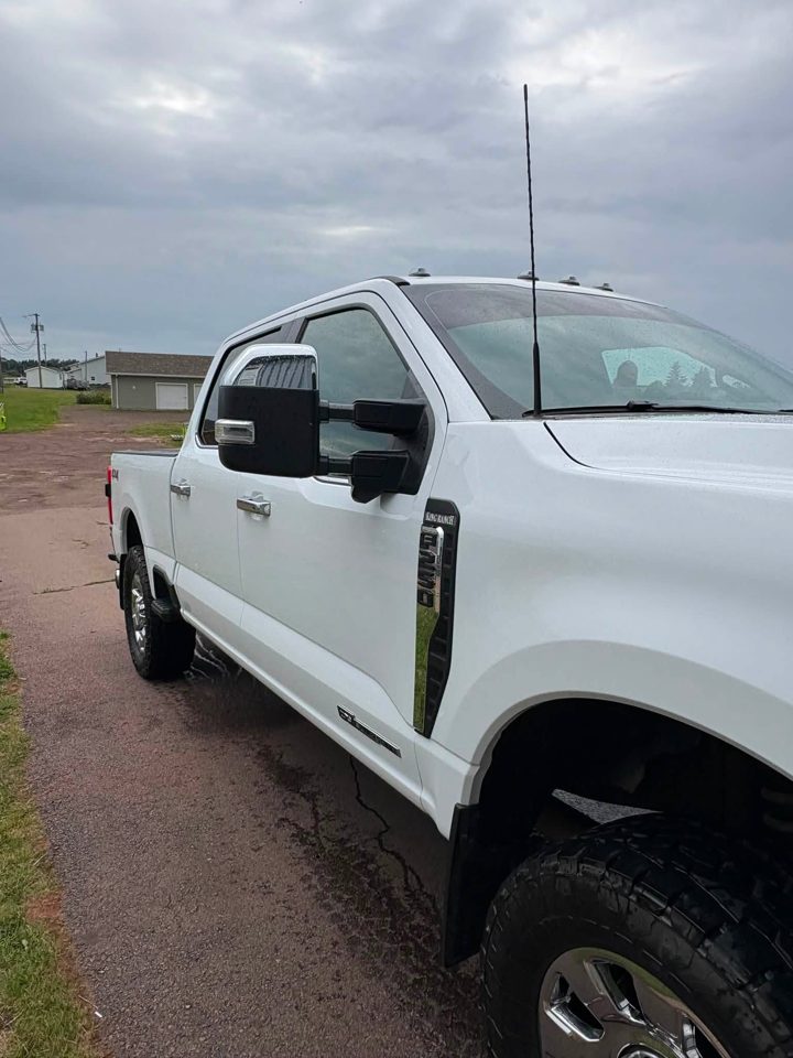white F-350 superduty front quarter, detailed by MG Detailing